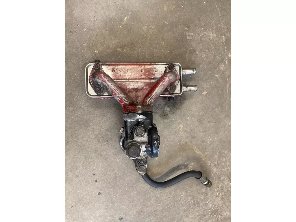 Case IH motorolie filterhuis met oliekoeler en pers slang voor turbo smering van 1255XL of 1455XL